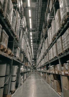 Long range view down an aisle of a warehouse
