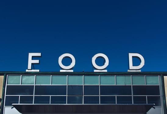 Boutique grocery store signage that reads: FOOD