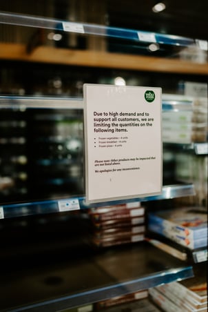 A sign on a Whole Foods Market refrigerator, warning of out of stock products