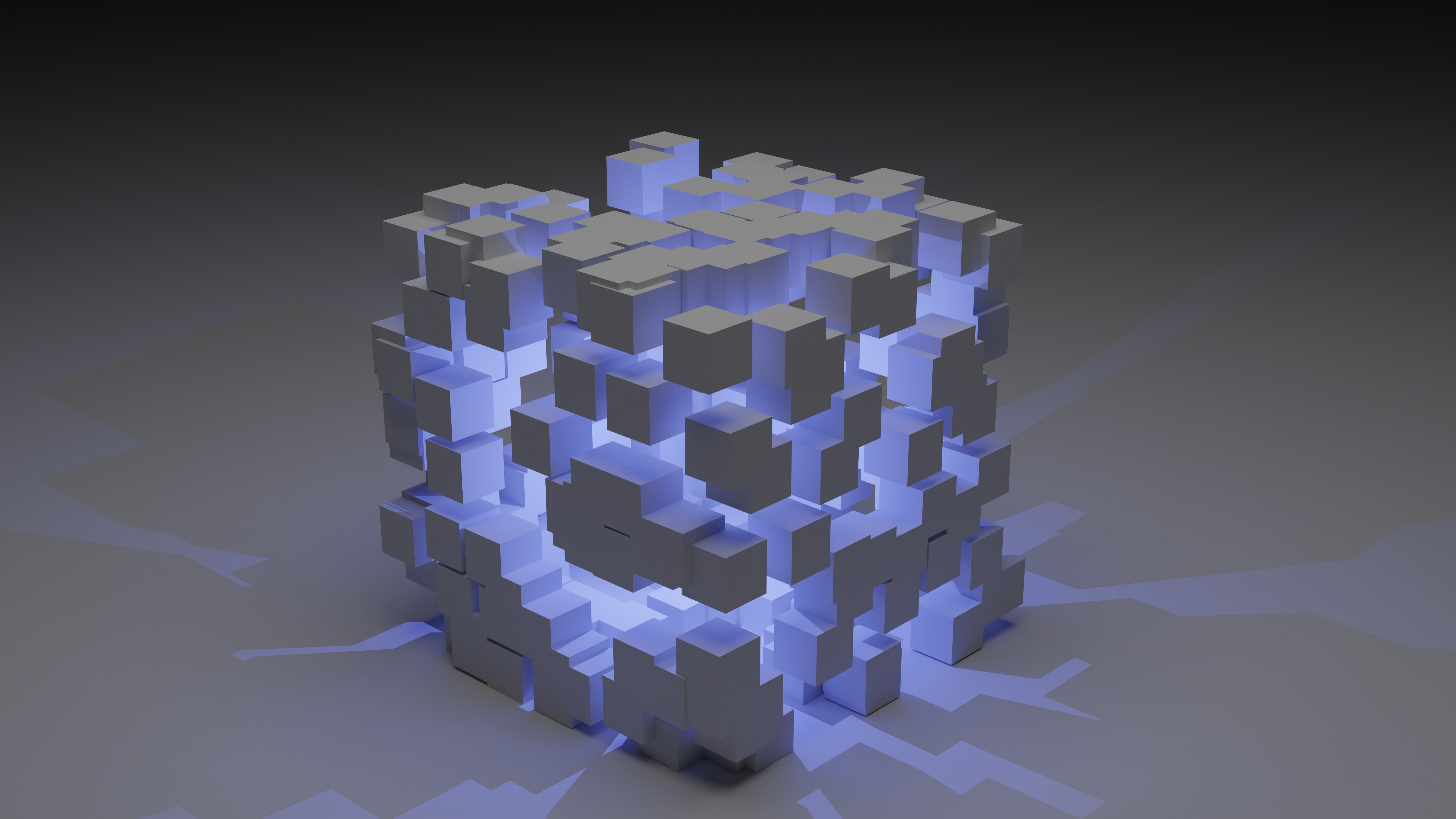 A graphic representation of blockchain: a blue and white cube made up of unique, separate parts