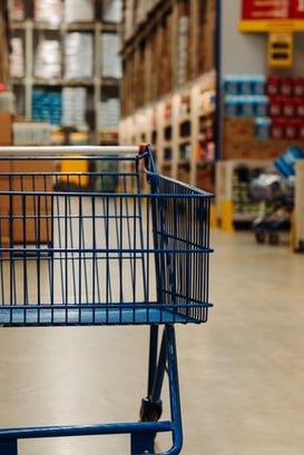 Empty shopping cart in a grocery store.