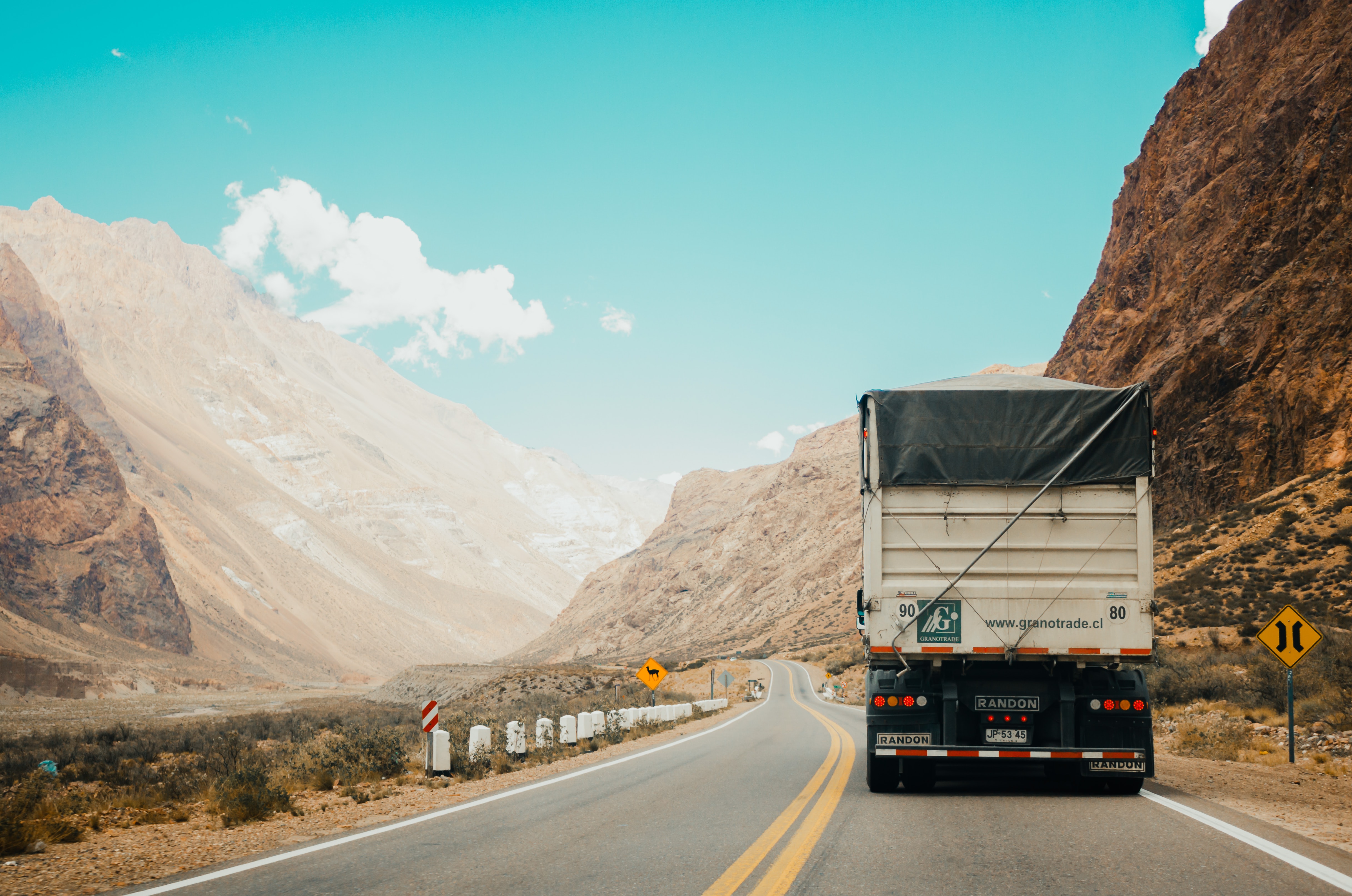 A delivery truck on a mountain road