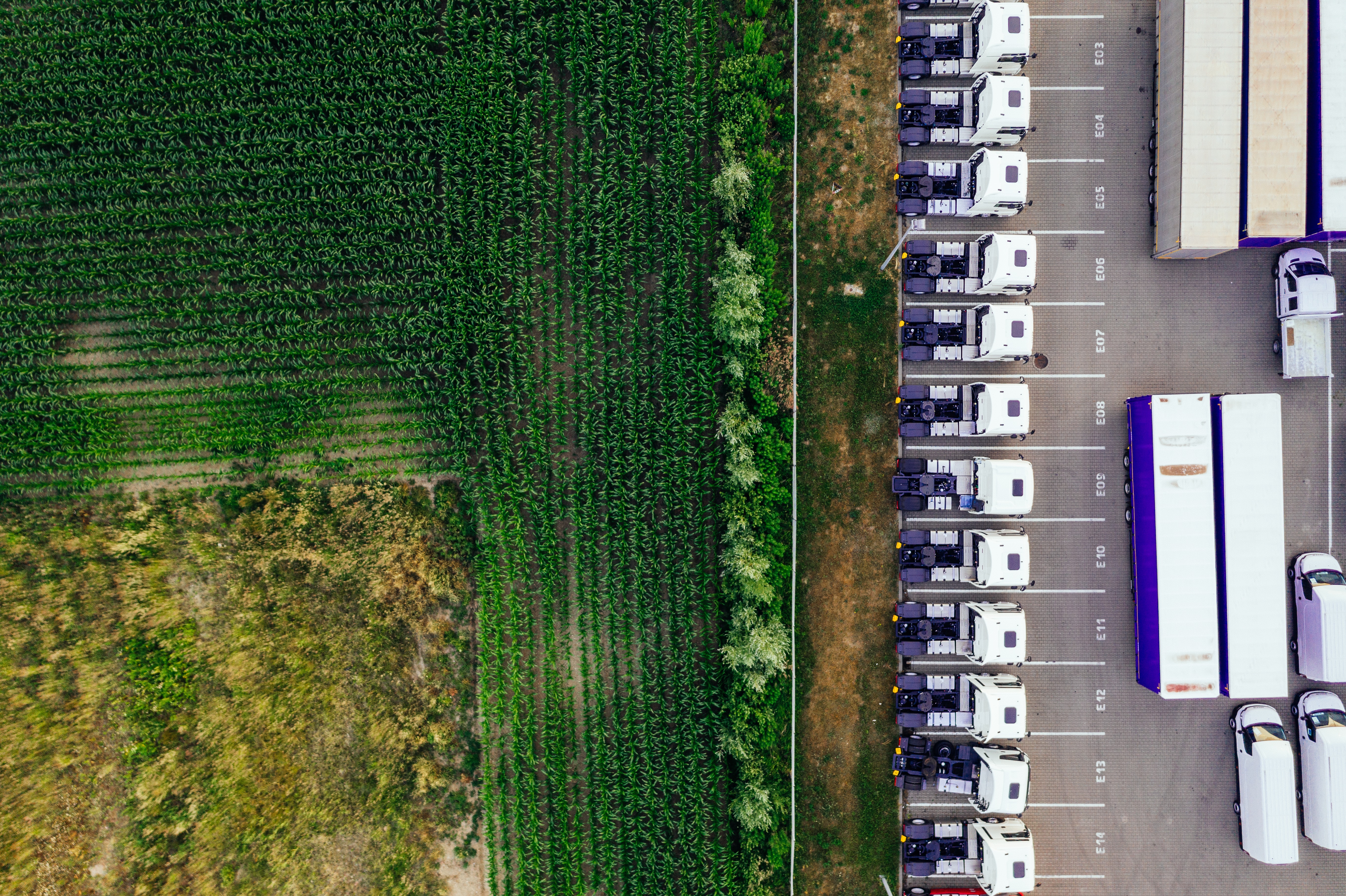 An aerial view of trucks outside a distribution center