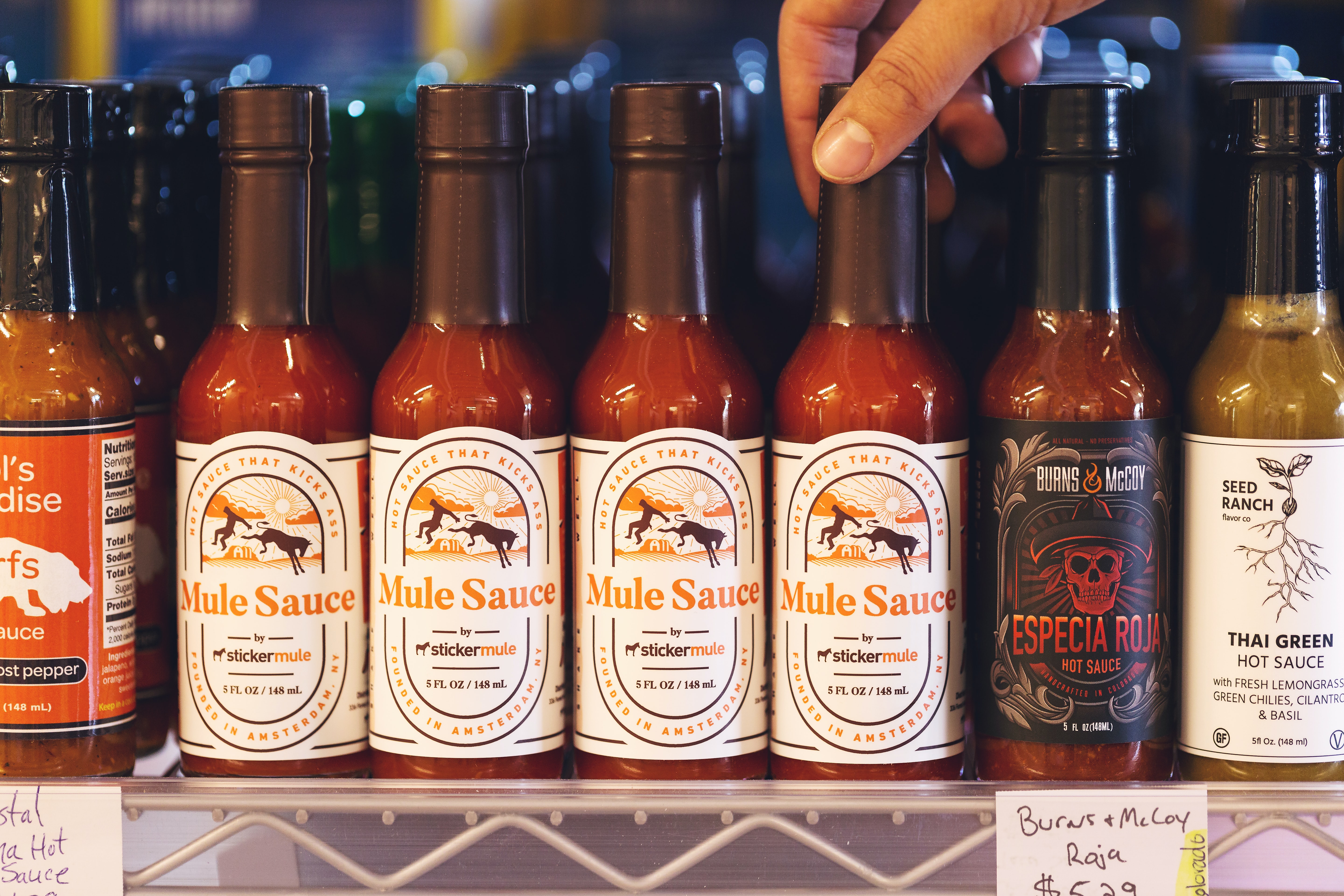 Food brokers find innovative CPGs — like the hot sauce brands shown here