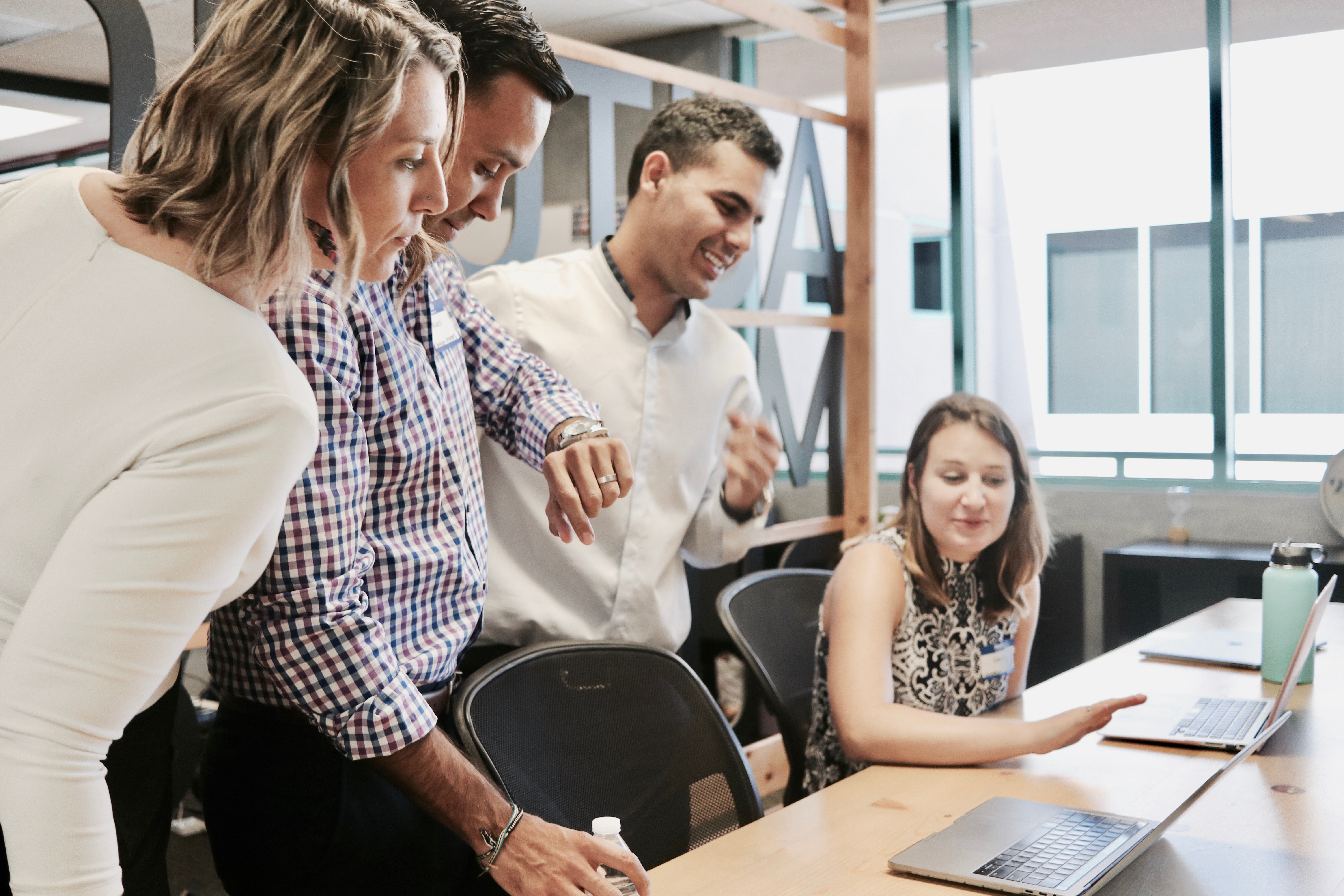 A group of people having a meeting.