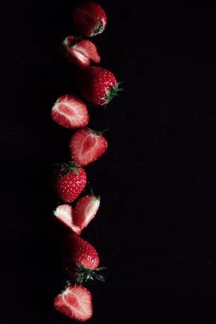 A line of strawberries falling.
