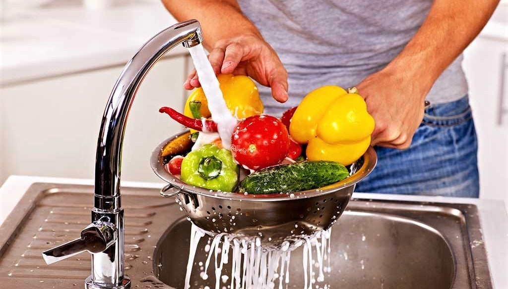 washing-vegetables-in-the-sink