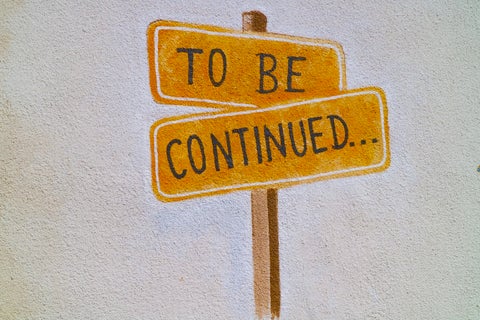 Painted on a page, the words: "To be continued"