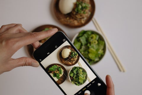 An Asian dish photographed through an iPhone