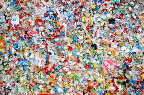 A mass of colored plastic bottles and packaging