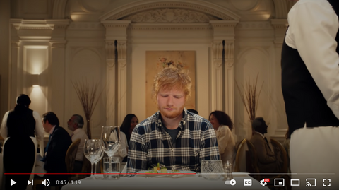 Still of Ed Sheeran at a restaurant