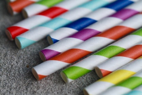 A collection of brightly colored paper straws