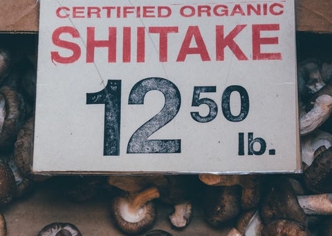 Certified organic shiitake mushrooms, sold at a farmer's market