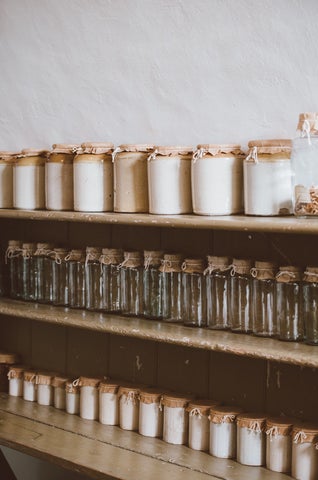 Empty jars on shelves.