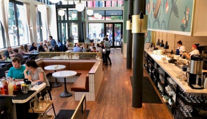 overhead view of restaurant with wooden floorboards